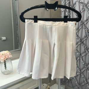 White pleated skirt